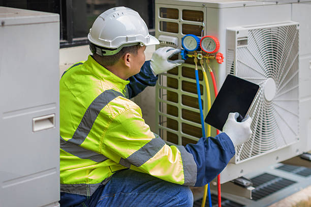 Professional Hvac technician working in White Cloud, MI
